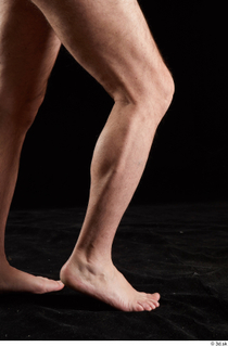 Spencer  1 calf flexing nude side view 0006.jpg